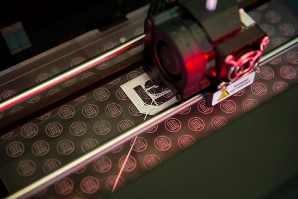 A 3D printer making an ISL logo