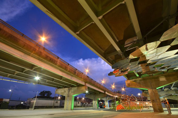 Toronto Underpass Park also incorporates public art, right, beneath the bridges