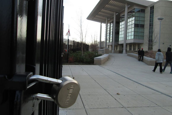 A gate at H.D. Woodson High School. "instead of trying to decrease the incarceration rate they are building things in Ward 7 that are similar to prisons."