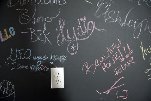 Thornton encourages her guests to sign in on her chalkboard wall