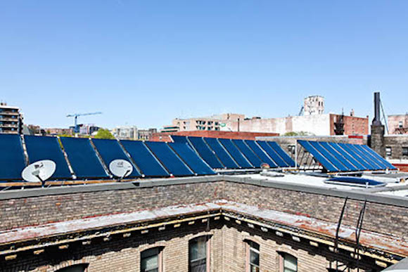 Solar thermal collectors on a building on 15th St NW