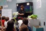 Teresa-Rodriguez-reads-to-a-visitng-class-of-kindergartners-at-AREC_thumb.jpg