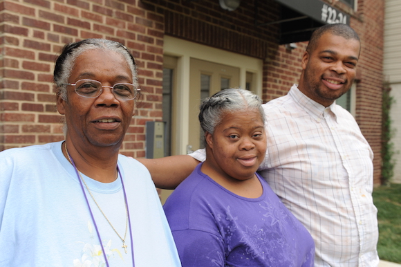 Abby Vineyard, 60, pictured with her daughter Alexis, 32, and son Sam, 30. Vineyard just bought her first condo. "The reason why we're here is because I push myself to do for them."