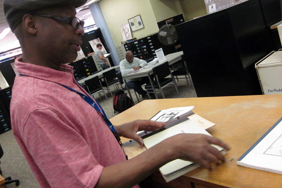 Special collections librarian Kenneth Despertt mans the desk at Washingtoniana. Despertt's unit contains exhaustive records on the District's history, encompassing maps, real estate records, business registries, genealogical records and others. 