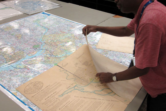 Old maps like this nineteenth century recreation of the original map of the district layout drawn by Pierre Charles L'Enfant fill the drawers and filing cabinets of Washingtoniana