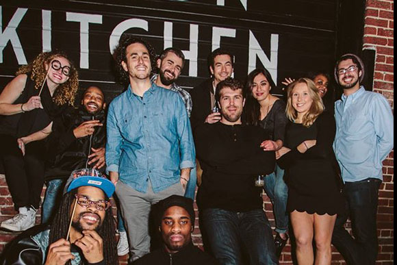 Jonas Singer, in blue, with Union Kitchen team