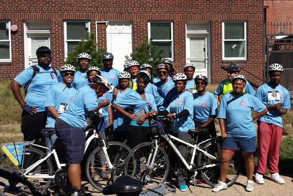 Gearin' Up took a ride with youth from the Department of Youth Rehabilitation Services. The shop's new space on Randolph Pl NE is visible in the background