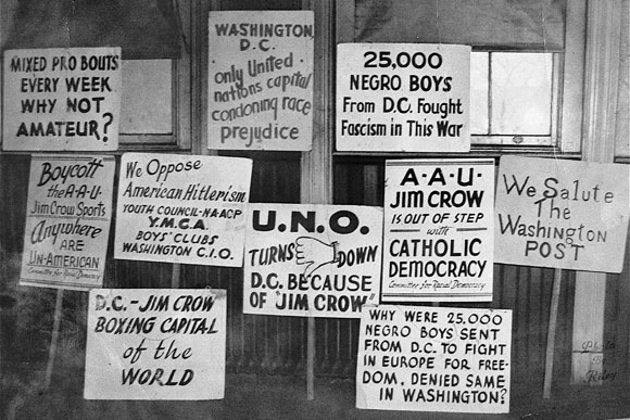 1948: Picket signs protesting the segregation at Uline