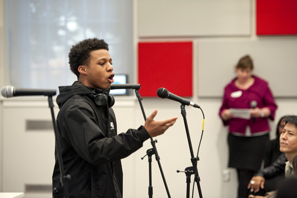 Taijai Williams, a member of the DC Youth Slam Team, performs a poem at #accessartDC