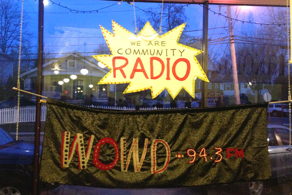 A banner from a WOWD pre-launch party in Takoma Park