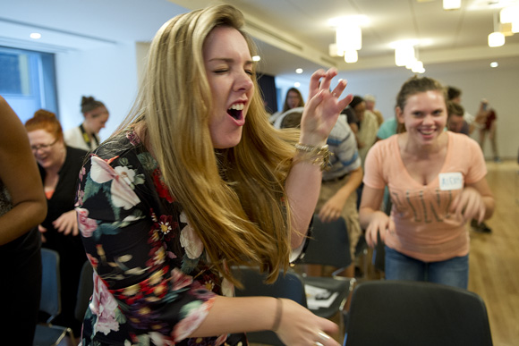 Participants act like eagles and bears during an improv game at "Art After Disaster"